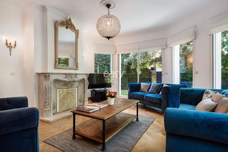 filming location featuring parquet floors and intricate moldings in Paris